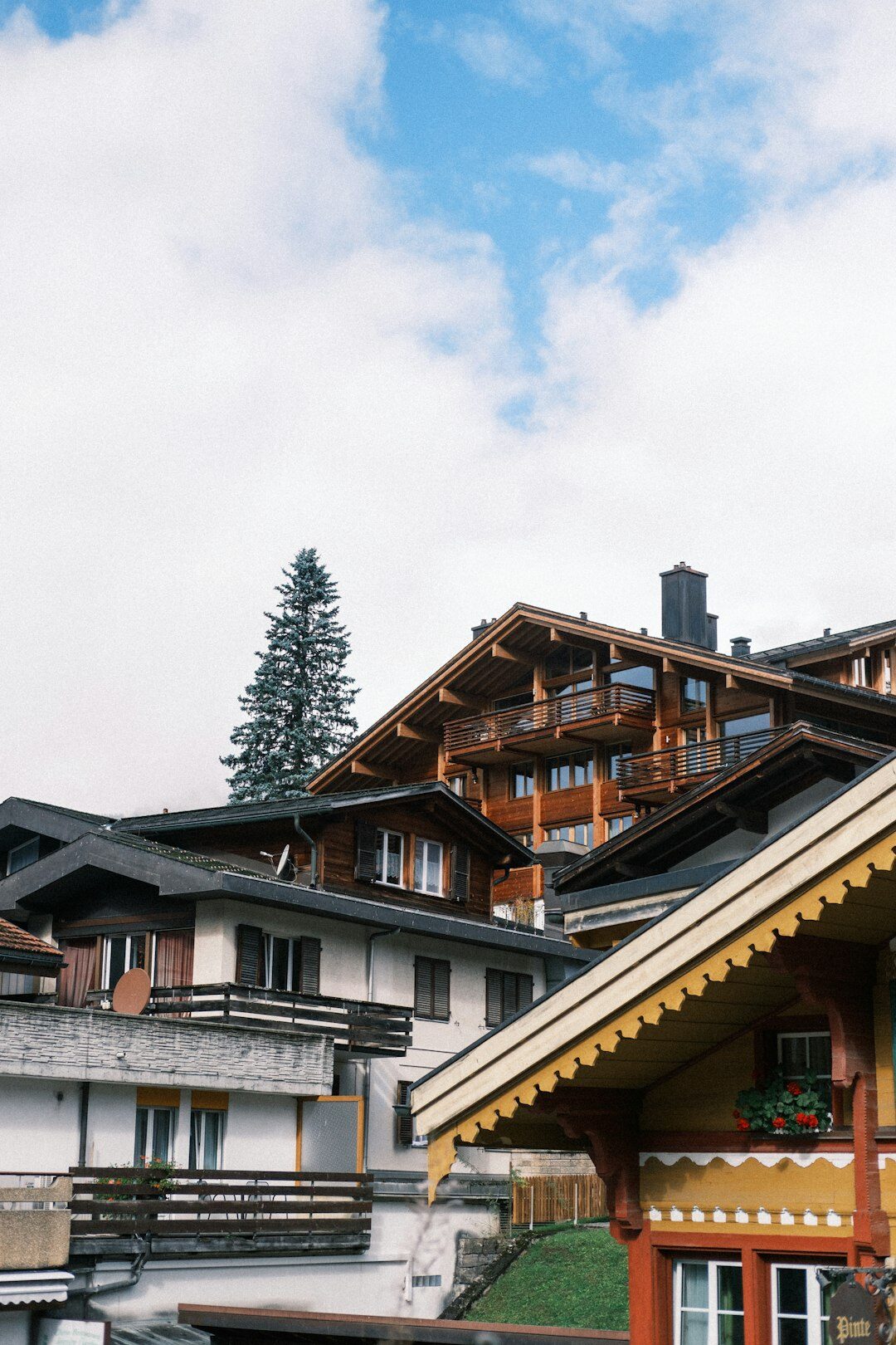 Cosy Swiss chalet interior with wooden beams and fireplace