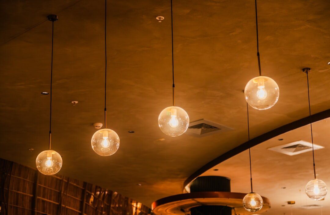 Warm ambient lighting fixtures in a refined interior
